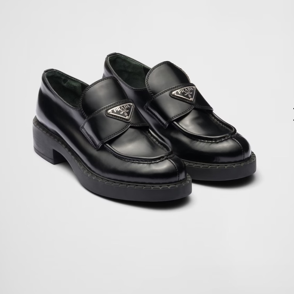 Prada black brush leather loafers